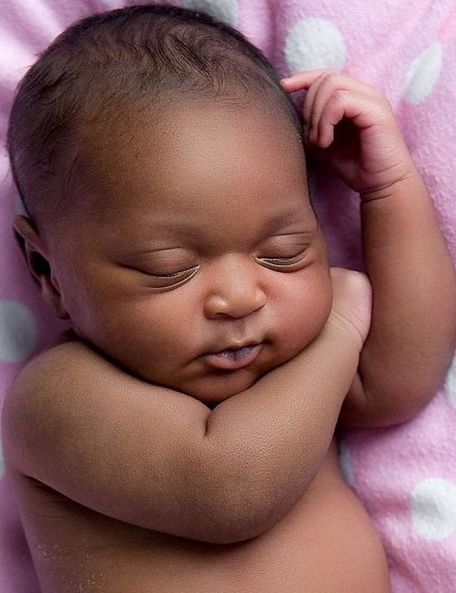 Sleepy new born African baby
